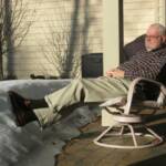 April and the remnants of the snow drift on the patio.